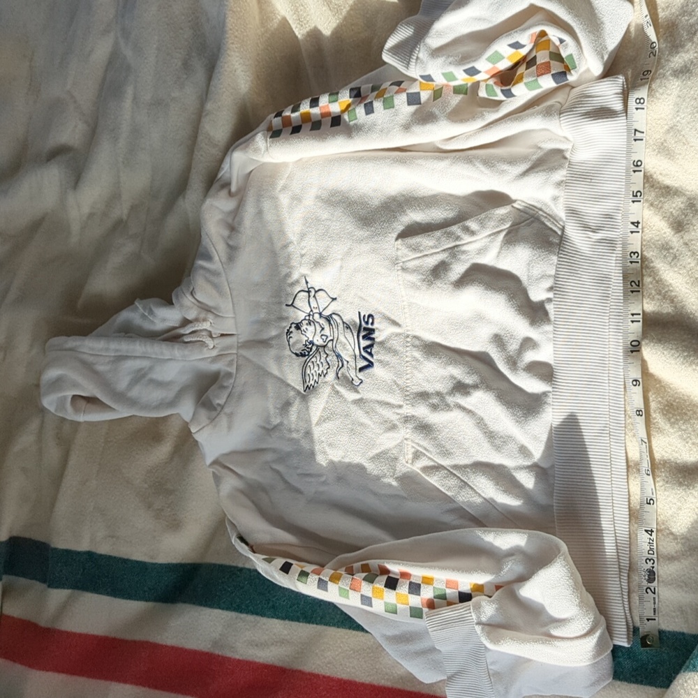 Vans white hoodie with cherub and checkerboard pattern, size medium